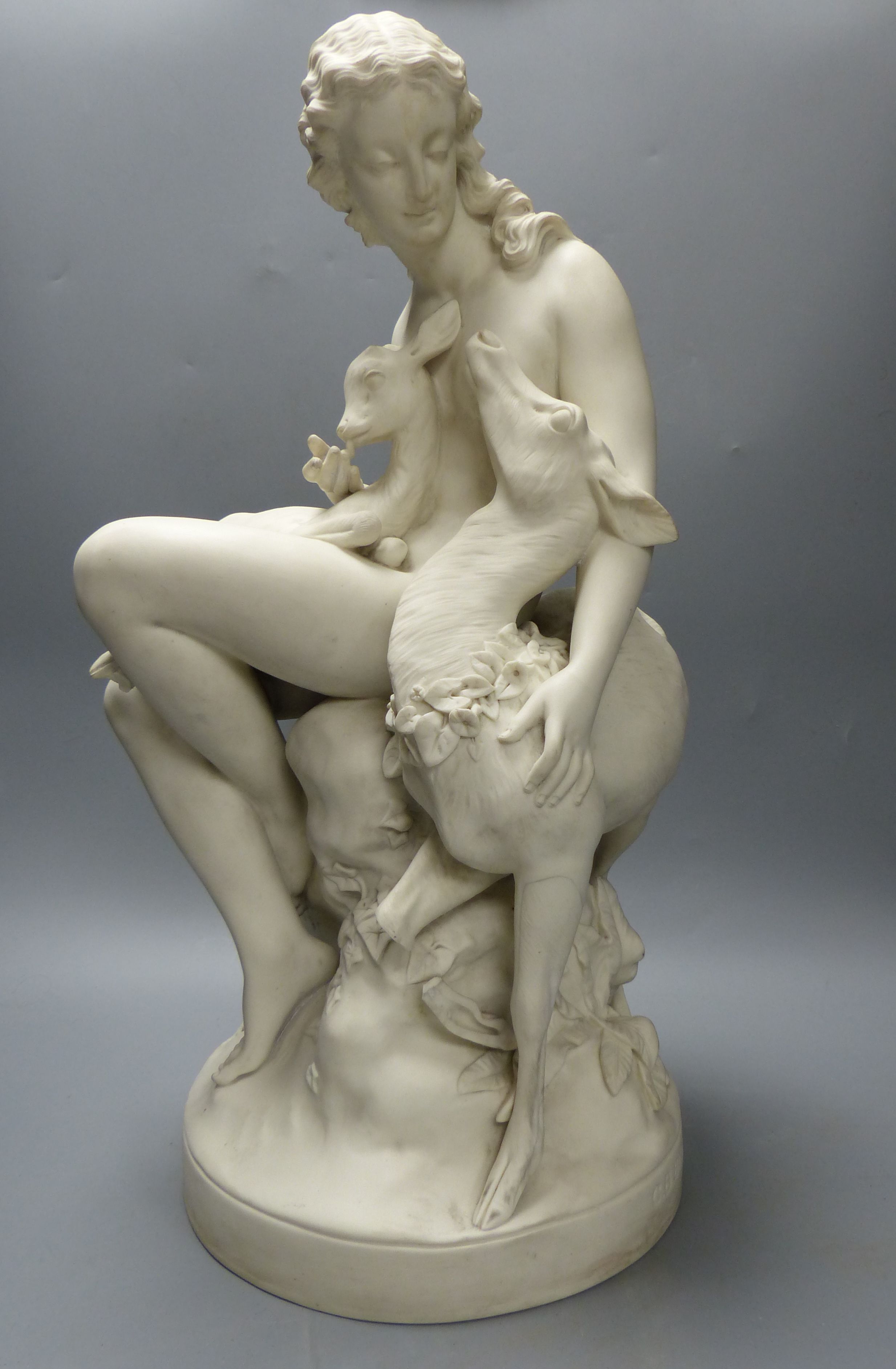 After C.B. Birch. A 19th century Parian group Wood Nymph with two deer, height 49cm